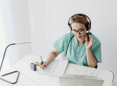 Telehealth worker advising a patient over the phone